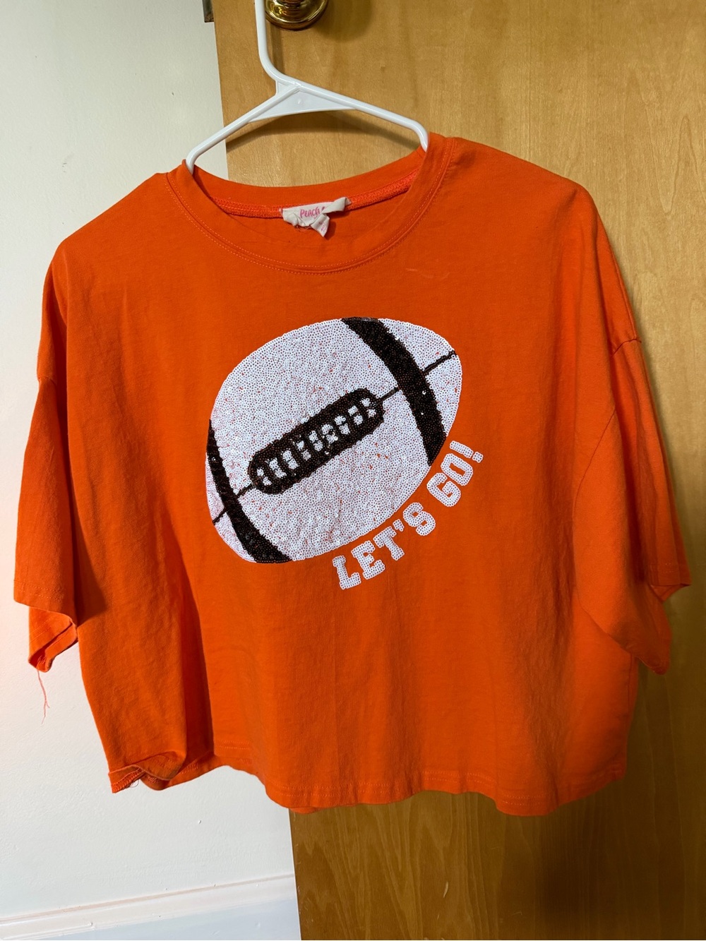 Peach Love California Orange Tee with Football Graphic